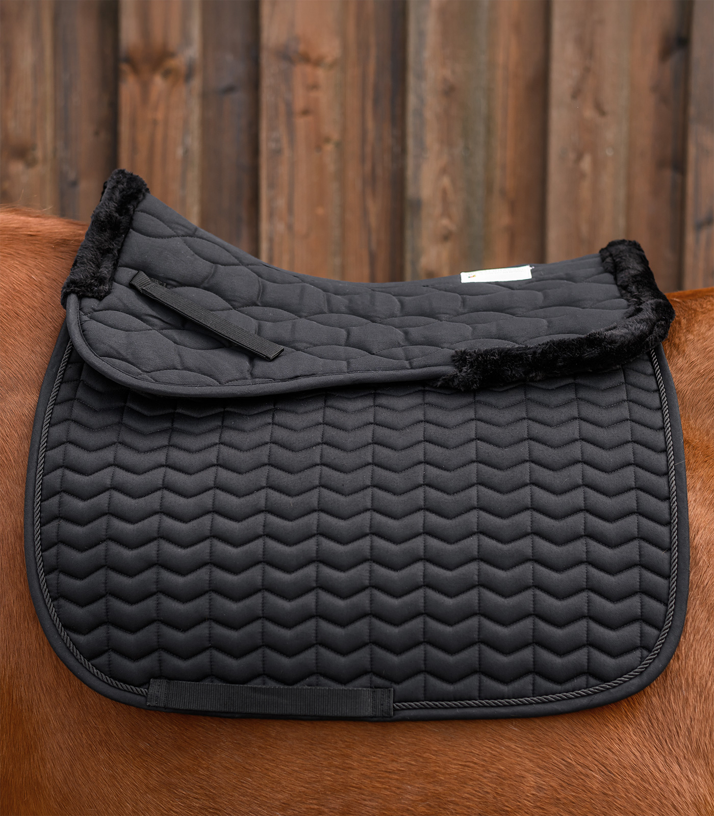 Almohadilla de borreguito sintético para mantilla